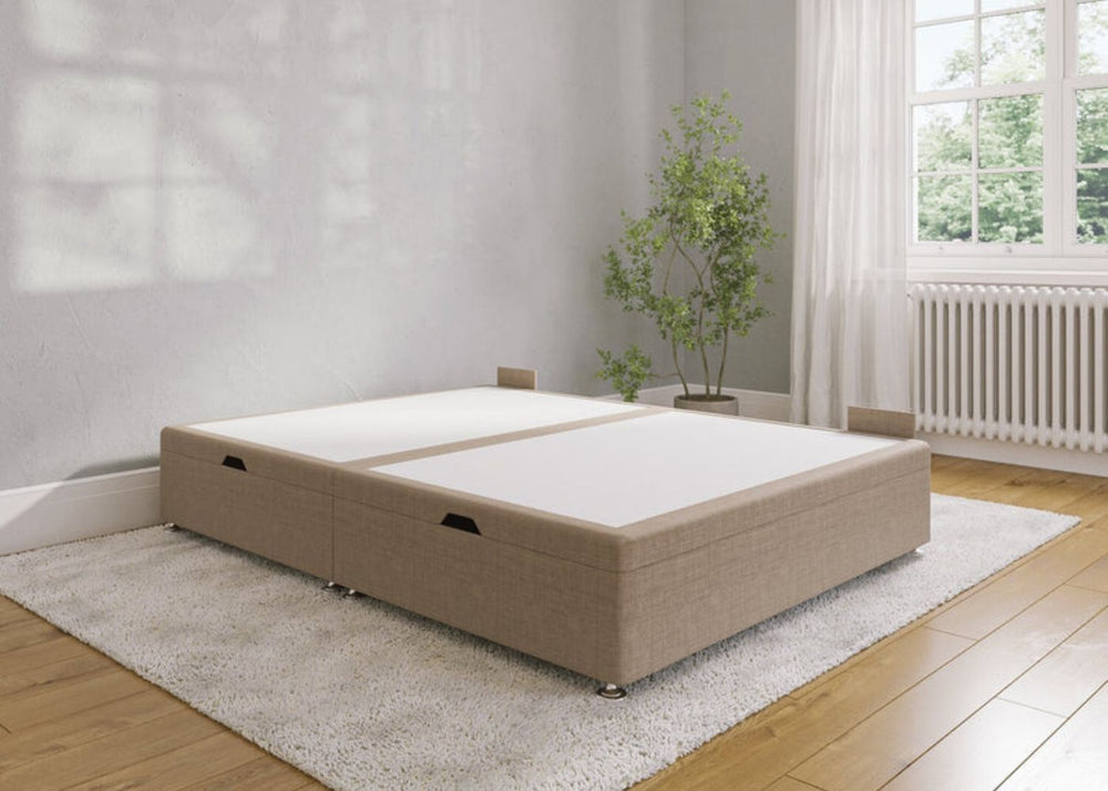 Sand bed frame with open gas lift storage compartment in a room with wooden floor