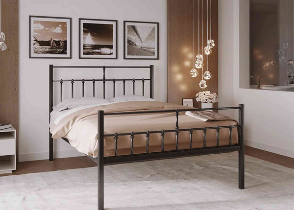 Angled view of Lauren metal bed in black, showcasing extra-strong steel headboard, footboard, and premium welded mesh base engineered to support up to 40 stone (254 kg) per sleeper.