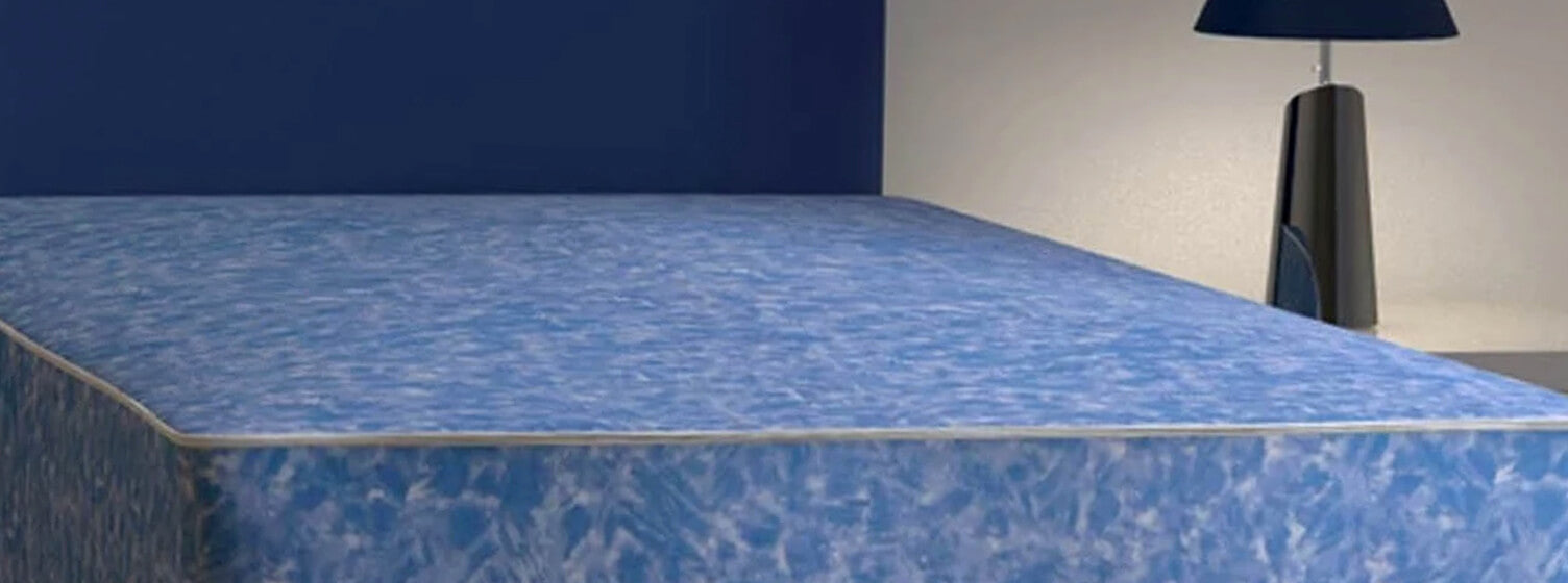 What kind of waterproof mattress should I buy for my care home?