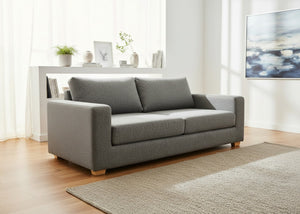 Endura sofa finished in dandy grey fabric in a lifestyle angle