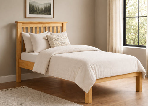 Barcelona LFE natural pine wooden bed frame with slatted headboard and low foot end.