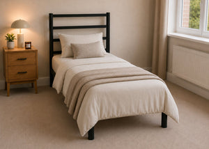 Becky metal bed frame with a slatted headboard and reinforced mesh base, single size.