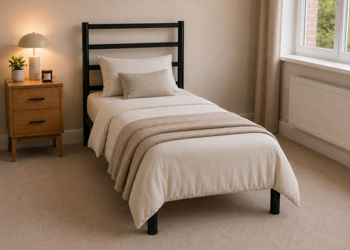 Becky metal bed frame with a slatted headboard and reinforced mesh base, single size.