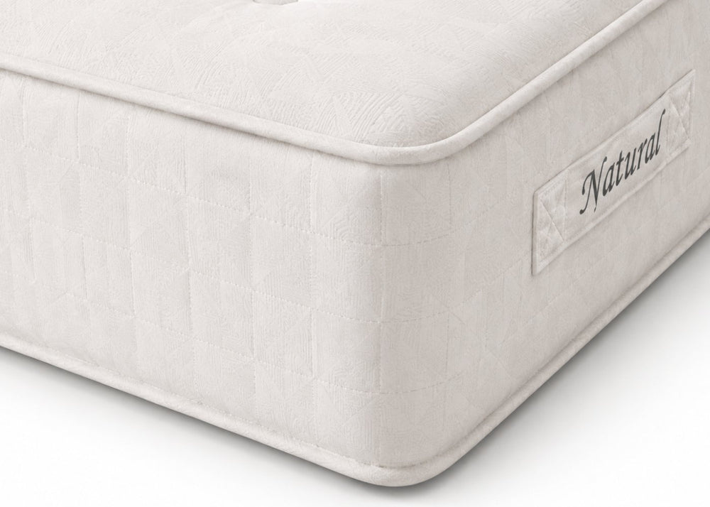 The Brick 'Natural' Mattress, a white, hand-tufted mattress with natural fillings