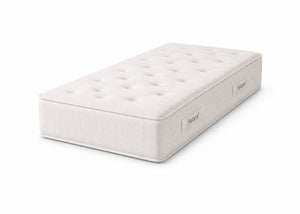 The Brick 'Natural' Mattress, a white, hand-tufted mattress with natural fillings in single size