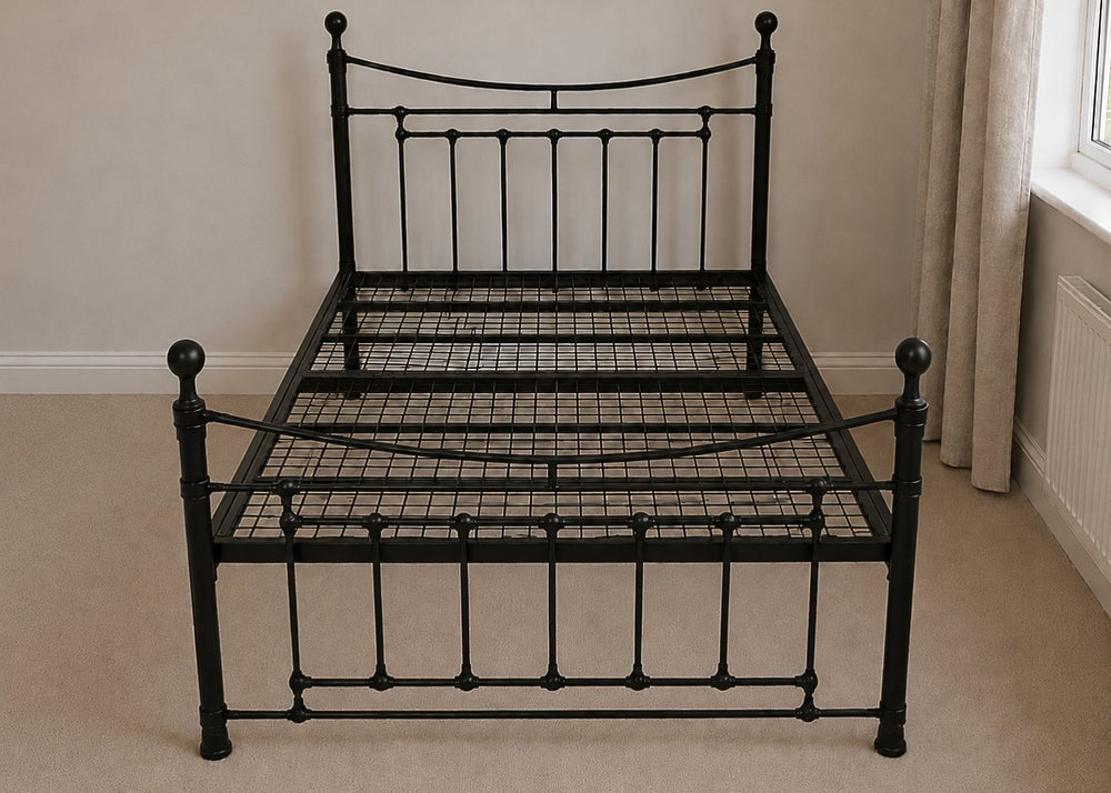 Black Calthorpe metal bed frame with reinforced mesh base, thick steel, and elegant finials.