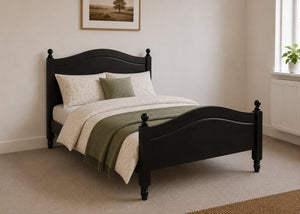 Dusseldorf solid pine bed frame with curved headboard and footboard, in black stain.