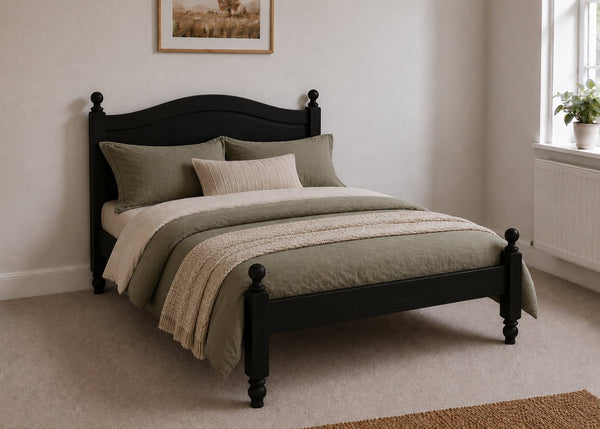 Dusseldorf Pine Bed frame with a natural finish, curved headboard, turned posts, and solid wooden slats in black stain.