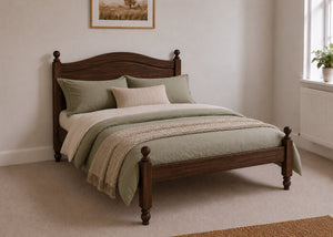Dusseldorf Pine Bed frame with a natural finish, curved headboard, turned posts, and solid wooden slats in chocolate stain.
