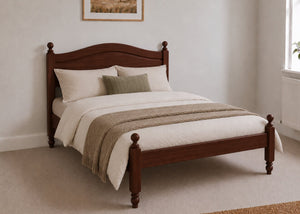 Dusseldorf Pine Bed frame with a natural finish, curved headboard, turned posts, and solid wooden slats in mahogany stain.