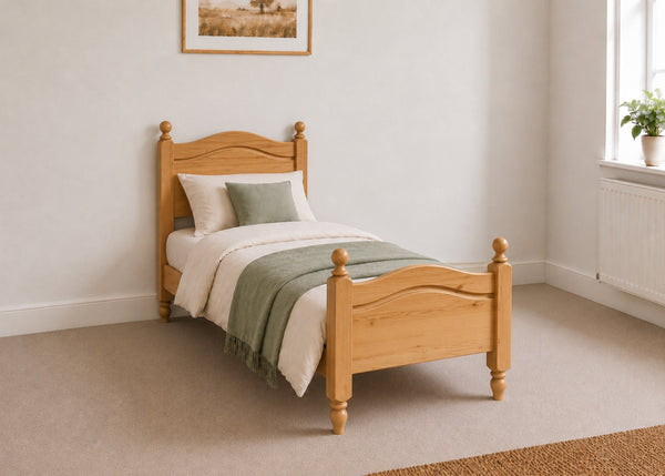 Dusseldorf solid pine bed frame with curved headboard and footboard, in antique stain single size.