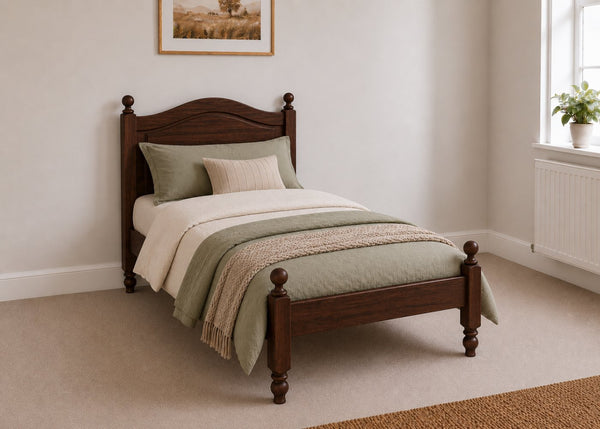 Dusseldorf Pine Bed frame with a natural finish, curved headboard, turned posts, and solid wooden slats in chocolate stain and single size.