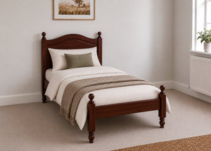 Dusseldorf Pine Bed frame with a natural finish, curved headboard, turned posts, and solid wooden slats in mahogany stain and single size.