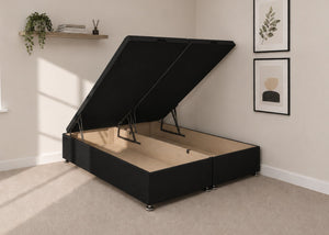 Black fabric end lift ottoman bed with open storage base and reinforced gas pistons.