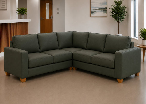 Endura Challenging Behaviour Sofa finished in Aston Bottle Green Vinyl in a 2+2 configuration