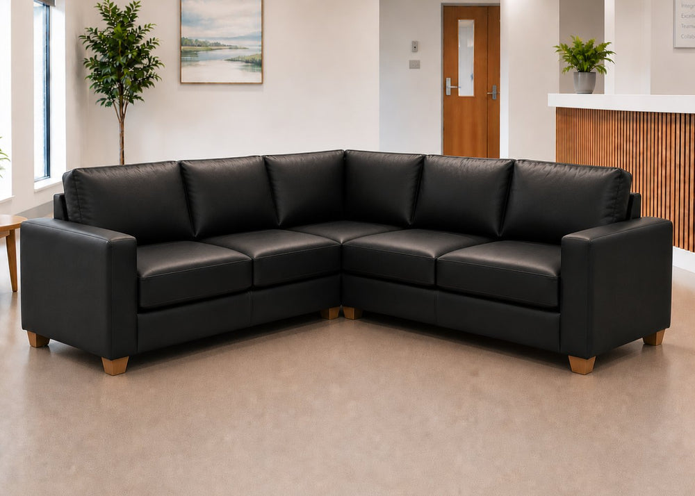 Endura Sofa finished in Black Vinyl in a 2+2 configuration