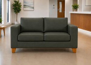 Endura Challenging Behaviour 2 Seater Sofa in Aston Bottle Green Vinyl Finish