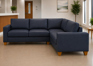 Endura Challenging Behaviour Sofa finished in Aston Navy Vinyl in a 3+1 configuration