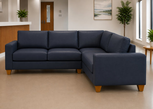 Endura Challenging Behaviour Sofa finished in Aston Navy Vinyl in a 3+1 configuration