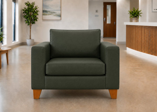 Endura Challenging Behaviour Armchair in Aston Bottle Green Vinyl Finish