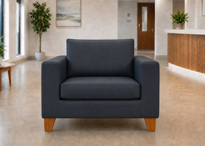 Endura Challenging Behaviour Armchair in Aston Navy Vinyl Finish