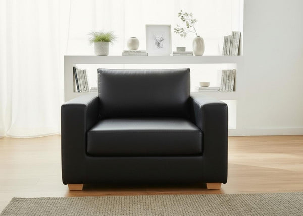 Endura Armchair finished in Black Vinyl