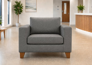 Endura Armchair finished in Dandy Grey fabric