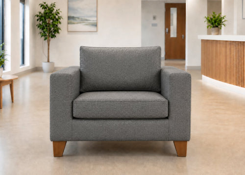 Endura Armchair finished in Dandy Grey fabric