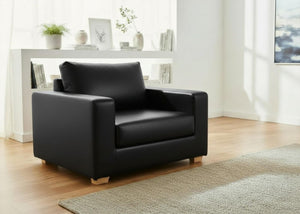 Endura Armchair finished in Black Vinyl