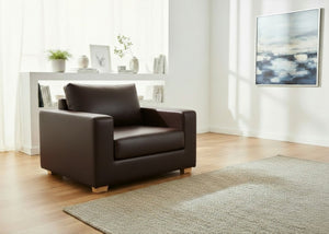 Angled view of Endura Armchair finished in Chocolate Vinyl