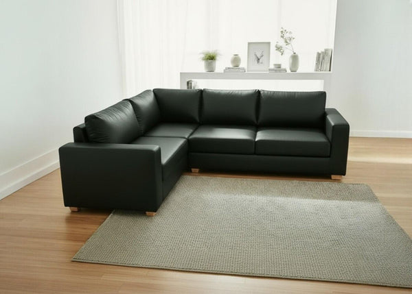 Endura Corner Sofa in Aston Bottle Green Vinyl Finish