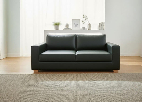 Endura Sofa in Aston Bottle Green Vinyl Finish (Front View)