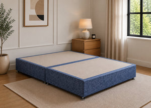 Reinforced nautilus upholstered divan base with non-slip top and silver feet.