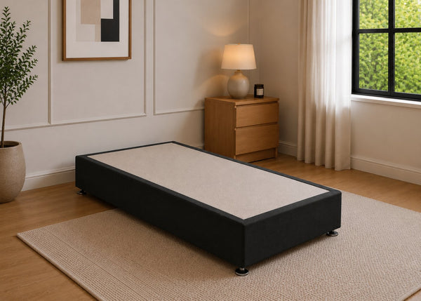 Single reinforced black upholstered divan base with non-slip top and silver feet.