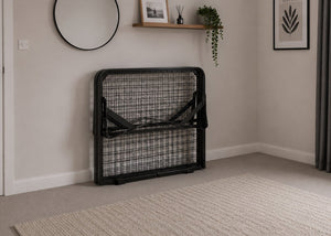 Black skid metal bed frame with reinforced mesh base and thick steel, folded for storage.