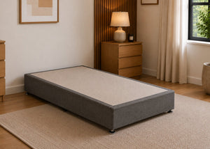 Single charcoal linen upholstered heavy-duty divan base with a non-slip top, designed for durability.