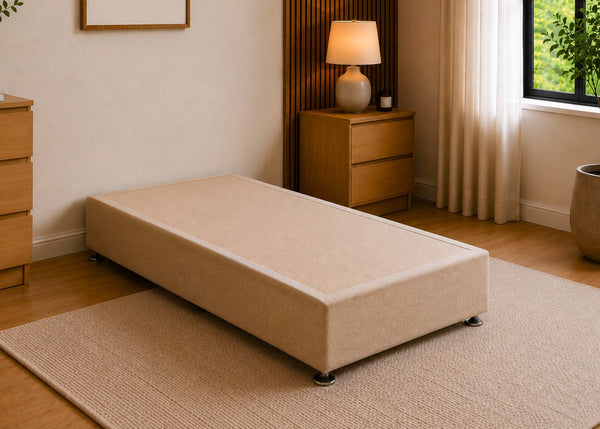 Single sand linen upholstered heavy-duty divan base with a non-slip top, designed for durability.