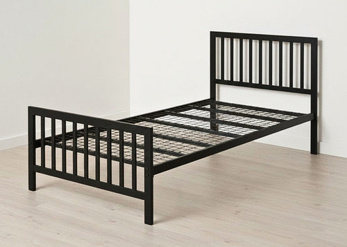 Black Holkham metal bed frame with vertical bar headboard, footboard, and reinforced mesh base.