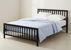 Black Holkham metal bed frame with vertical bar headboard, reinforced mesh base, and thick steel construction.