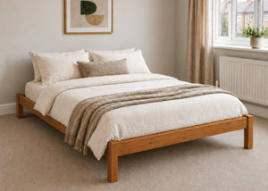Lille pine wooden bed frame with solid slats in a minimalist design, in oak stain.