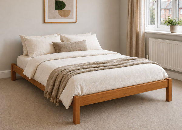 Lille pine wooden bed frame with solid slats in a minimalist design, in oak stain.