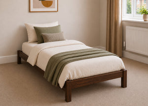 Lille pine wooden bed frame with solid slats in a minimalist design, in chocolate stain single size.