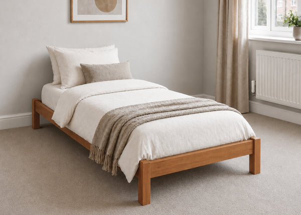 Lille pine wooden bed frame with solid slats in a minimalist design, in oak stain single size.