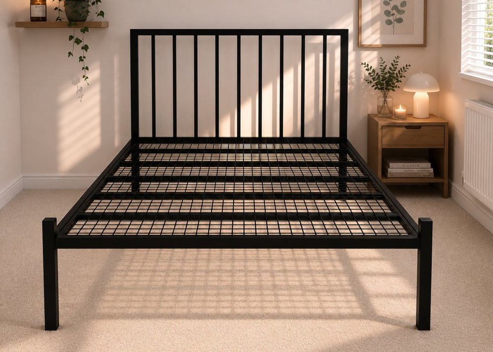 Mandy metal bed frame with vertical slat headboard and reinforced mesh base.