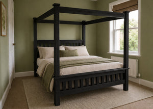 Regent natural wood four poster bed frame with thick square posts and strong slatted base in black finish.