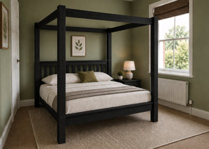 Regent natural wood four poster bed frame with thick square posts and slatted base in black finish.