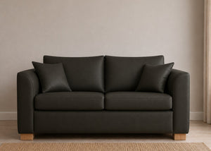 Rowan Sofa Bed in Black Faux Leather with Natural Feet