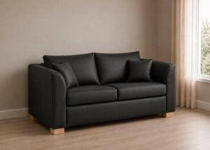Rowan Sofa Bed in Black Faux Leather with Natural Feet, Angled View