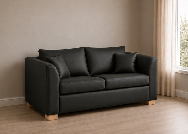 Rowan Sofa Bed in Black Faux Leather with Natural Feet, Angled View