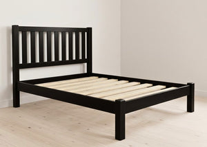 Black wooden shaker bed frame with a slatted headboard and solid wooden slats.